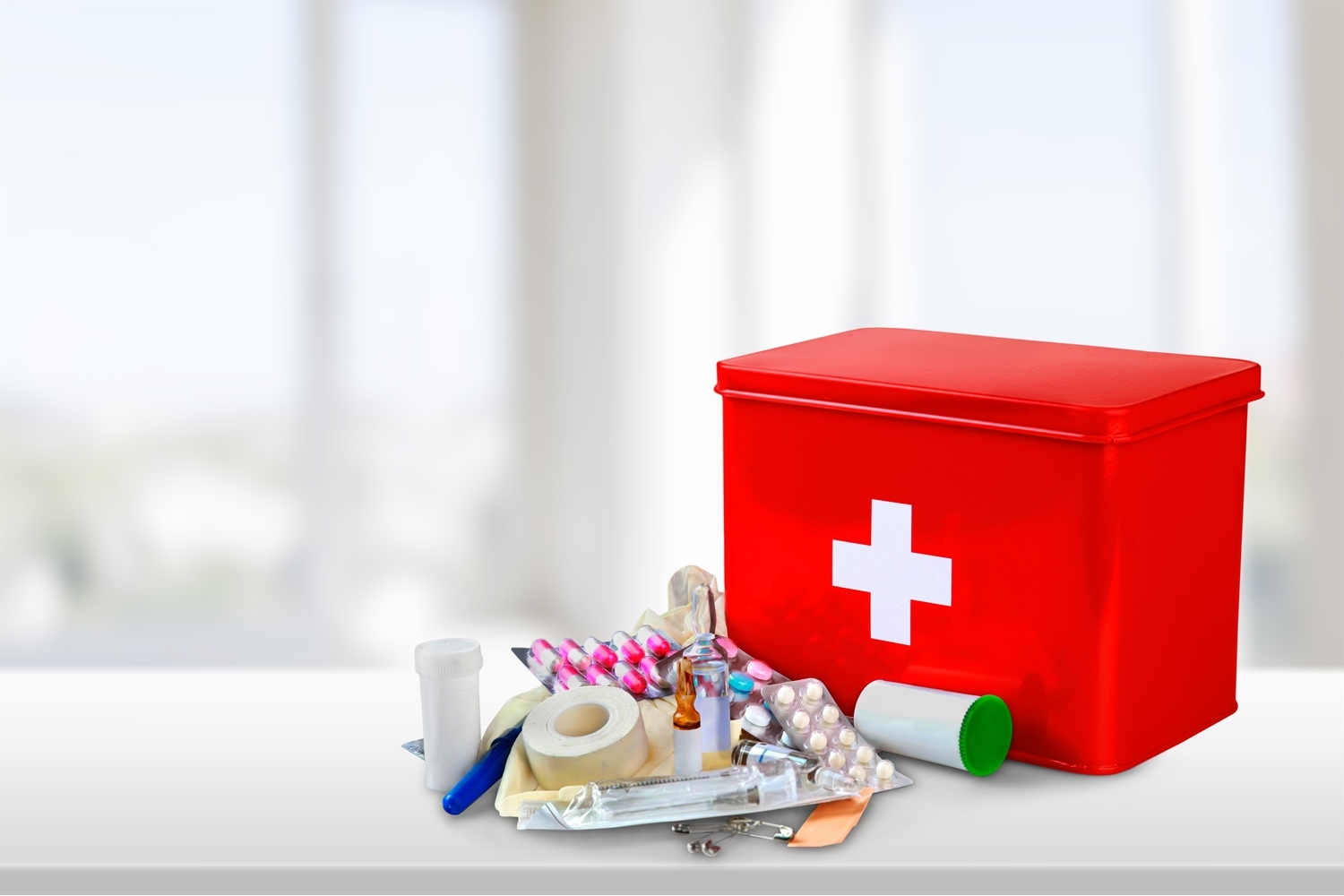 What should be included in a First Aid Kit